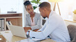 © Charlize Davids/peopleimages.com - Black people, laptop and teamwork for business, planning and brainstorming strategy together in office. Computer, collaboration and African corporate consultants in discussion for research project