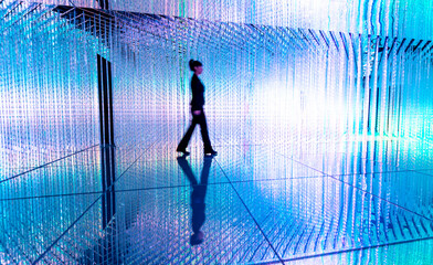 businesswoman walking in the beautiful bokeh light