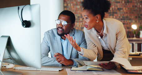 Poster - Collaboration, confused and a mentor with an employee in the office at night for project management. Computer, teamwork or planning with a problem solving business man and woman working together