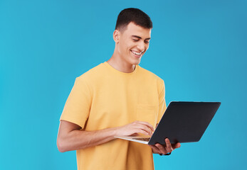Aufkleber - Laptop, research and man student in a studio working on a university project on the internet. Smile, technology and young male person studying for college test or exam on computer by blue background.