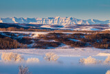 Fototapeta Góry - Bow River Valley in fog with the Rocky Mountains in the background, Calgary, Alberta