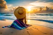 A vibrant beach towel spread out on the sand, with sunglasses and a hat for a day of relaxation.