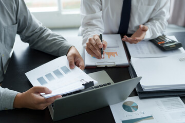 Wall Mural - Financial inspector calculating a numbers in office room.