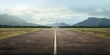 © piai - An empty airstrip with mountain background. Generative AI