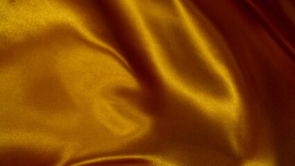 Canvas Print - Super Slow Motion of Waving Golden Satin Cloth. Filmed on High Speed Cinema Camera, 1000 fps. Closeup.