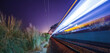 © ADDICTIVE STOCK - Magnificent view of fast train against starry sky
