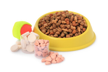 Sticker - Dry pet food in bowl, vitamins and toy isolated on white