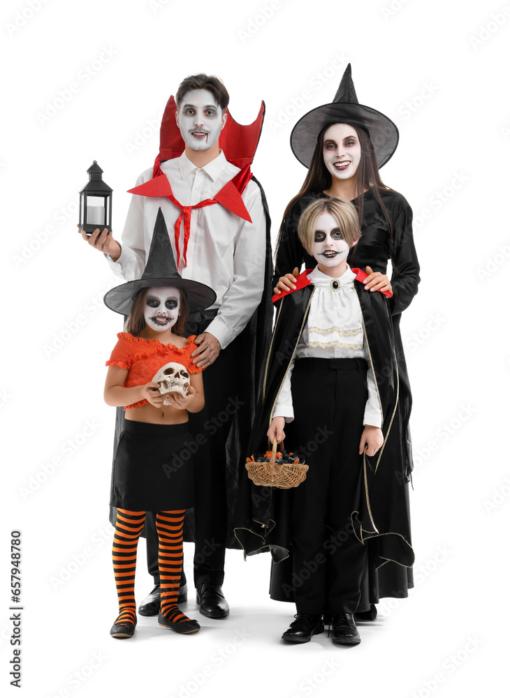 Happy family dressed for Halloween on white background