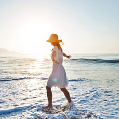 Poster - Young woman having fun walking on seaside.