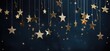 Golden star decorations hanged on a black background, christmas concept.