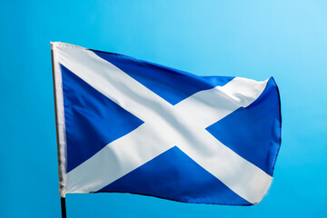 Poster - Scottish flag waving on blue background