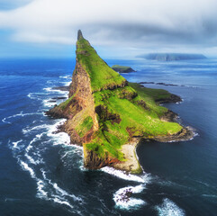 Sticker - Faroe Islands Vagar, aerial drone view of Tindholmur island during sunset in North Atlantic Ocean. Faroe Islands, Denmark, Europe.