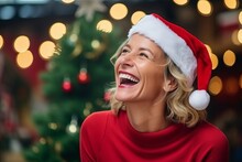 Portrait Of Happy Woman In Santa Hat On Christmas Background