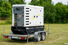Connected Large Rental Diesel Generator On A Mobile Trailer For Outdoor Event Power Supply