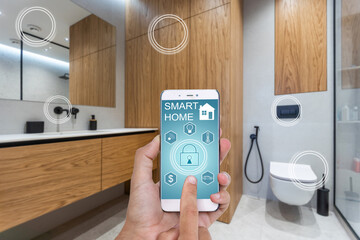 Wall Mural - man hand holding phone with app smart home in room house