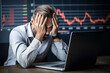 A frustrated investor looks over a negative property portfolio on his computer screen, regret and concern filling his expression