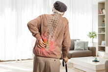 Rear View Shot Of An Elderly Man With A Back Pain And Visible Cervical Spine