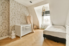 Baby's Room With Crib And Bed And Toys