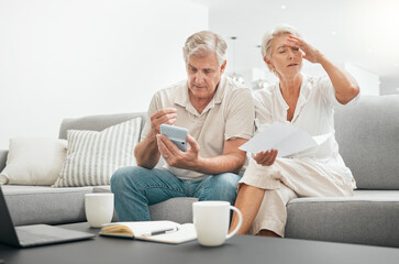 Canvas Print - Frustrated senior couple, documents and debt on living room sofa in financial crisis, expenses or bills at home. Mature man and woman checking finance, paperwork or budget with calculator for invoice