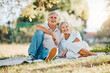 © Clement Coetzee/peopleimages.com - Senior couple, portrait or picnic in park for love, support or bonding retirement in Australia nature garden. Smile, relax and elderly man and happy woman on blanket in backyard grass field for break