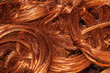 Scrap copper stripped cables twisted and collected in a heap, close-up.
