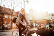 Mature businessman commuting to work on a bicycle in the city