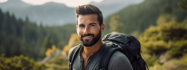 Poster - Man wearing backpack standing on autumn forest trail, hiking alone