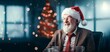 Smiling portrait of a happy caucasian man with Christmas hat  in a business office decorated for christmas and the new year holidays