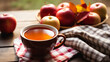 A cozy image of a September 2024 calendar page next to a cup of hot apple cider, symbolizing the start of the fall season