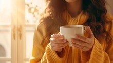  Woman Holding A Cup Of Coffee. Drink Morning. Beautiful Woman Hands Holding Hot Cup Of Coffee On A Cozy House Drinks A Hot Drink. 