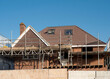 Europe, UK, England, Surrey, scaffolding on house roof renovation