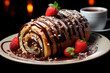 Roll with buttercream, covered with chocolate and nuts and decorated with strawberries on a plate