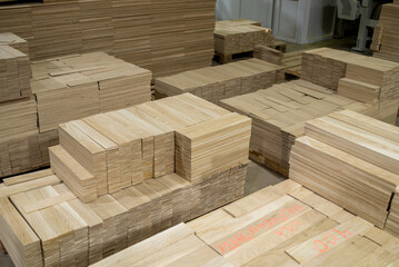 Wall Mural - Finished wooden planks. Production of wooden parts. Modern production technologies. Woodworking industry