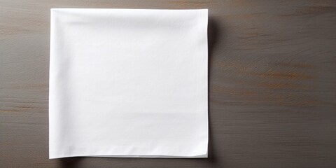 Poster - top view with white empty kitchen napkin isolated on table background. Folded cloth for mockup with copy space, Flat lay. Minimal style. : Generative AI