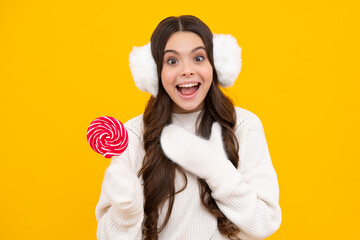 Sticker - Teenage girl with lollipop, child eating sugar lollipops, kids sweets candy shop. Excited teenager girl.