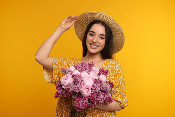 Sticker - Beautiful woman with bouquet of spring flowers on yellow background