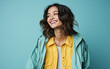 © hakule - happy fashion smiling girl with bright clothing in solid light background