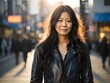 wide angle and full body portrait of attractive mature Japanese female with long curly black hair wearing black Leather Jacket during late autumn sunset. Generative Ai.