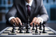 Business model and leadership collide as a professional engages in a chess game, embodying concepts of achievement, development, and strategic thinking