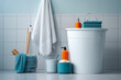Various cleaning items for bathroom in a bucket on modern minimalist bathroom. buildings concept of cleaning and washing.