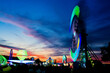 Blurred lights of a carnival ride at sunset at the Creek County fair on Route 66 in Sapulpa, Oklahoma.