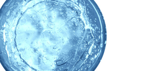 Wall Mural - Transparent blue cosmetic gel in a round jar. View from above. On an empty background.