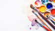 © julijadmi - Paints and brushes for painting on a white background.
