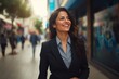 © blvdone - Businesswoman smile happy face portrait on city street