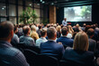 © Michael - presenter speaks to businessmen at educational courses in the conference hall or seminar meeting