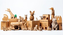 Assorted homemade cardboard toys on a white backdrop