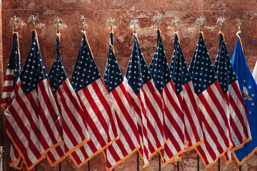 Many American flags in a row. National symbol of the United States of America