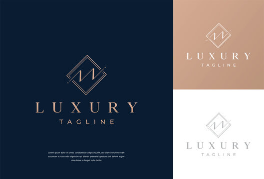 m letter calligraphy minimal monogram emblem style vector logo. Gold color and black background.
