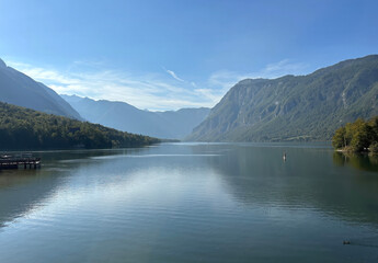  Beautiful landscape on Bohinj lake against the backdrop of mountains and blue sky
