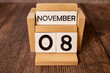Calendar for November 8: name of the month in English, numbers 0 and 8 birch branch with